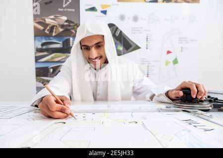 Focused arab architect working on a new project Stock Photo