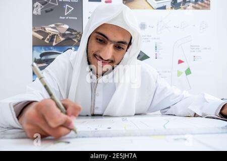 Focused arab architect working on a new project Stock Photo