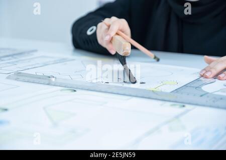 Architect hands with pen and ruler Stock Photo
