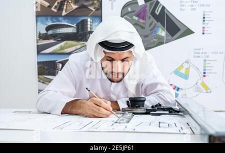 Focused arab architect working on a new project Stock Photo