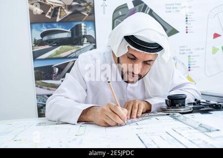 Focused arab architect working on a new project Stock Photo