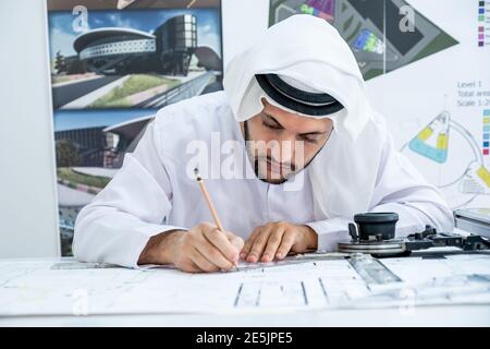 Focused arab architect working on a new project Stock Photo