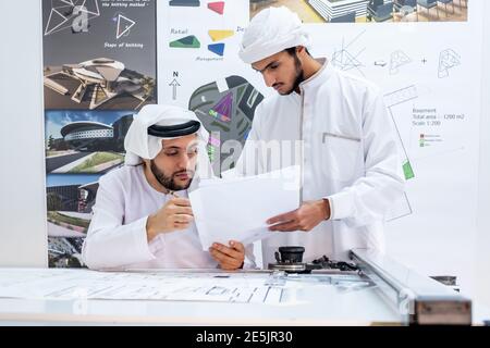 Two male architects working and thinking about new ideas together Stock Photo