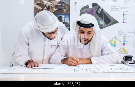 Two male architects working and thinking about new ideas together Stock Photo