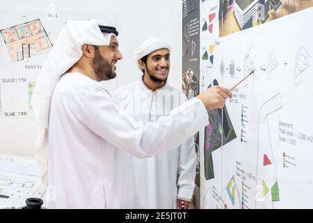Two male architects working and thinking about new ideas together Stock Photo