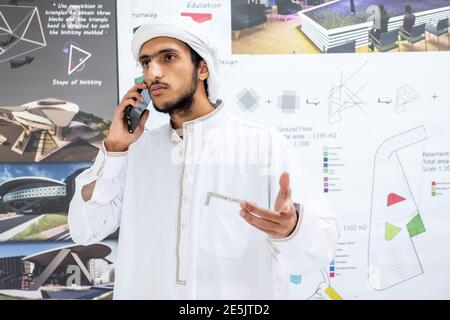 Arab male architect talking and discussing things on the phone Stock Photo