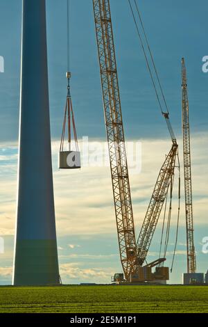 bruck an der leitha, austria, 19 march 2013, crawler crane building a wind power plant Stock Photo