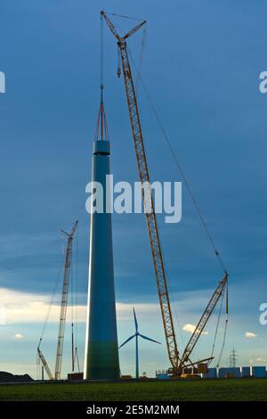 bruck an der leitha, austria, 19 march 2013, crawler crane building a wind power plant Stock Photo