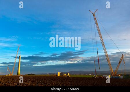 bruck an der leitha, austria, 19 march 2013, crawler crane building a wind power plant Stock Photo