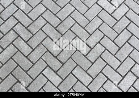 Sidewalk gray tiles diagonally. Texture, pattern. Copy space Stock Photo