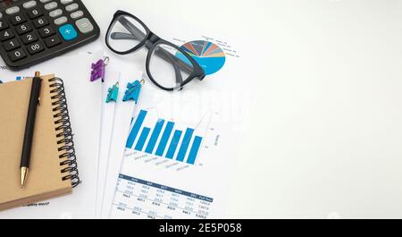 Business accounter working with documents and calculator on white office desk, top view Stock Photo