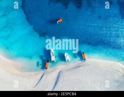 Aerial view of the fishing boats and yachts on tropical sea coast Stock Photo