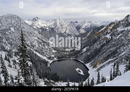 View of snowy Lake Ann and the cascades from the Maple Pass loop trail in the North Cascades National Park In Washington State, USA Stock Photo