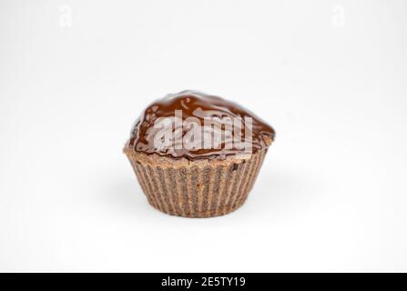 Homemade chocolate brown muffins isolated on white background Stock Photo