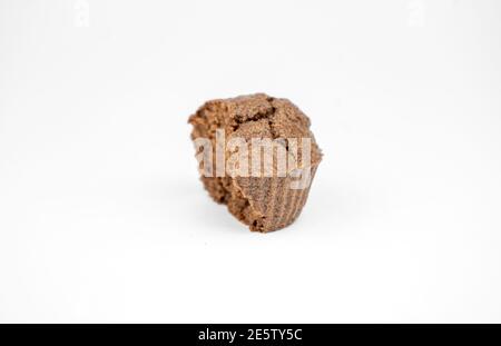 Homemade chocolate brown muffins isolated on white background Stock Photo