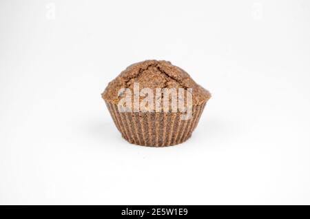 Homemade chocolate brown muffins isolated on white background Stock Photo
