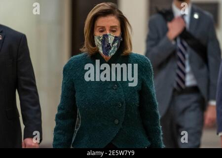 Washington, United States. 28th Jan, 2021. Speaker of the House Nancy Pelosi, D-CA., walks down the hallway on her way to her weekly news conference in the Capitol Visitor Center in Washington, DC on Thursday, January 28, 2021. Pelosi spoke about the impeachment of former President Donald Trump saying that, 'No one is above the law.' Photo by Ken Cedeno/UPI Credit: UPI/Alamy Live News Stock Photo