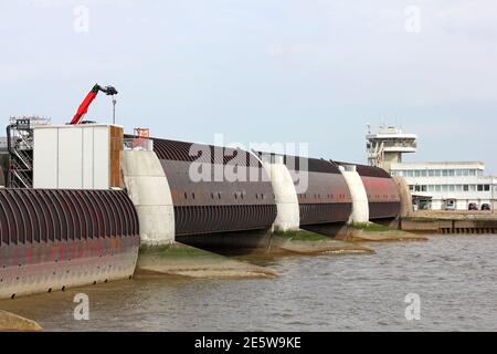 Repair work at the Eider Barrage at the North sea coast in Germany Stock Photo