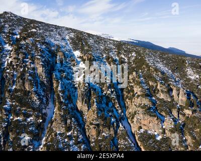 Aerial winter view of Rocky hills near Malyovitsa peak, Rila Mountain, Bulgaria Stock Photo