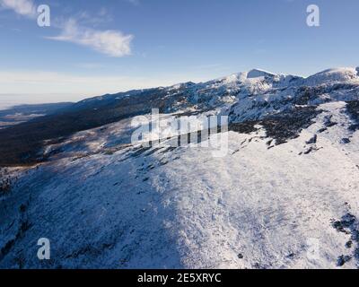 Aerial winter view of Rocky hills near Malyovitsa peak, Rila Mountain, Bulgaria Stock Photo