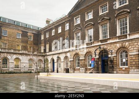 London, United Kingdom - February 01, 2019: Guy's Campus of King's College - empty square with entrance to Guys chapel - one of oldest parts in origin Stock Photo