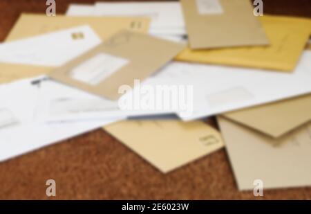 Close up of a pile of mail on doormat Stock Photo