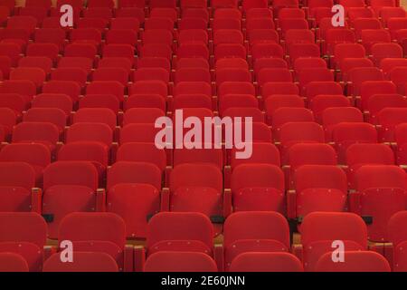 back view of empty red velvet seats in movie theater Stock Photo - Alamy