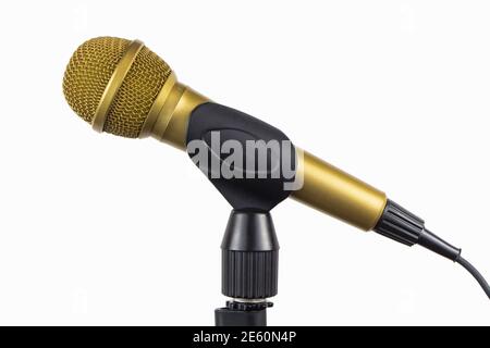 Golden microphone on a stand isolated on white Stock Photo