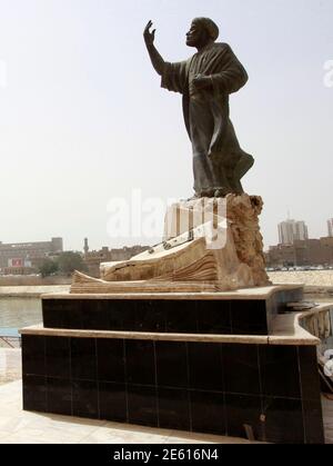 A Statue Of Mutanabi A 10th Century Poet And One Of The Towering Figures Of Arabic Literature Is Seen On The Banks Of The Tigris River In Baghdad April 5 2011 Reading