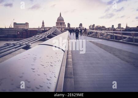 Sunset on the Millennium Bridge looking towards St Paul's Cathedral