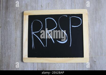 RRSP wrote on a chalk board. January is RRSP season  Stock Photo