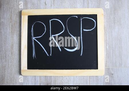 RRSP wrote on a chalk board. January is RRSP season  Stock Photo