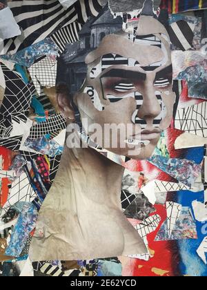 Old torn poster with a woman's face, grunge texture background Stock Photo