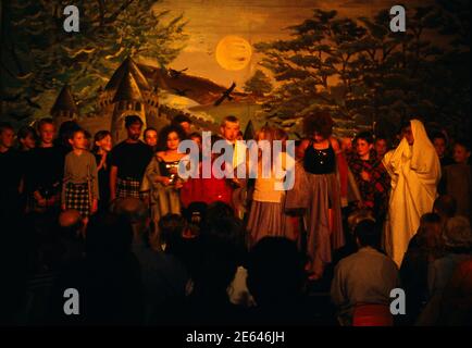 School Children Performing Shakespeare Play Macbeth on Stage England Stock Photo