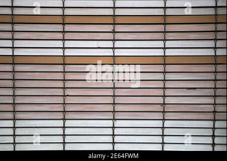 detail of a alicantina shutter wood color deteriorated and oxidized Stock Photo