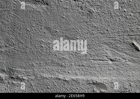 Exterior wall of a building with rough texture and painted white with copy space Stock Photo