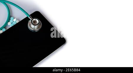 Stethoscope on the tablet, The concept of medicine and medical treatment Stock Photo