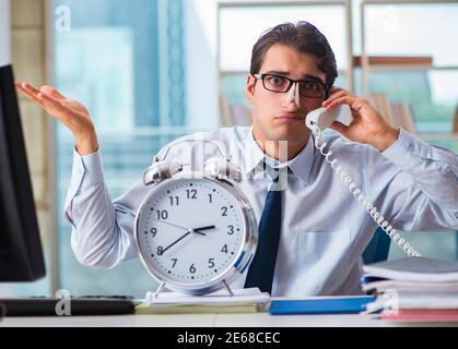 The businessman suffering from excessive armpit sweating Stock Photo