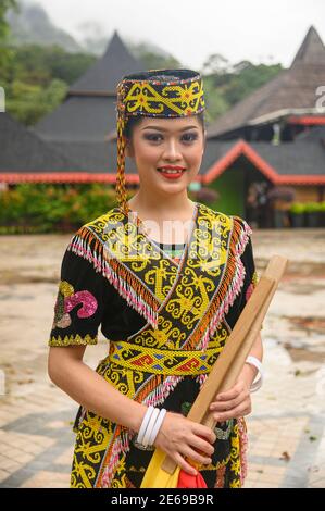 woman wearing Orang Ulu costume at the Sarawak Cultural Village Stock ...