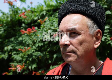 Portrait of a senior Kuban Cossack in the garden Stock Photo