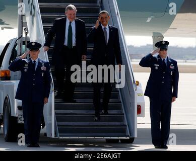U.S. President Barack Obama arrives at O'Hare International Airport with U.S. Sen. Richard Durbin (D-Ill) (center L) in Chicago March 16, 2012. REUTERS/Larry Downing  (UNITED STATES - Tags: POLITICS TRANSPORT)
