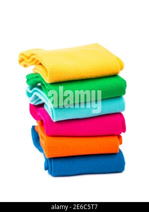colored socks stacked on a white background Stock Photo