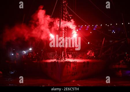 French skipper Jean Le Cam celebrates after crossing the finish line of the Vendee Globe round-the-world solo sailing race, in Les Sables-d'Olonne, western France, on January 29, 2021. Vendee Globe high-seas hero Jean Le Cam, who sailed to the rescue of a desperate shipwrecked rival Kevin Escoffier, arrived home in France and admitted: 'I don't know how I got here'. The 61-year-old Le Cam crossed the finish line at the French port of Les Sables-d'Olonne after his epic round-the-world adventure in 81 days, 5 hours, 59 minutes and 55 seconds. Photo by Arnaud Masson/ABACAPRESS.COM Stock Photo