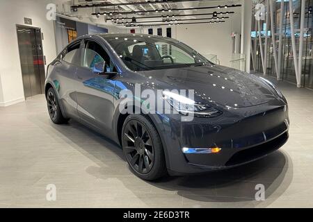 A Tesla Model Y electric car, Thursday, Jan. 28, 2021, in Santa Monica, Calif. Stock Photo