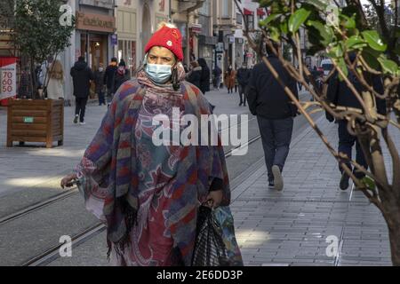 People wearing face masks walk on a street in İstanbul, Turkey, on January 28, 2021. Turkey has registered more than 7,200 new coronavirus cases, Health Ministry data showed late Thursday. A total of 7,279 cases, including 670 symptomatic patients, were confirmed across the country, according to the the data. Turkey's overall case tally is over 2.45 million, while the nationwide death toll has reached 25,605, with 129 fatalities over the past day. Photo by Mine Toz- Depo Photos/ABACAPRESS.COM Stock Photo