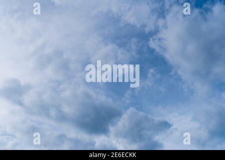 Cloudy bright blue sky with clouds Stock Photo