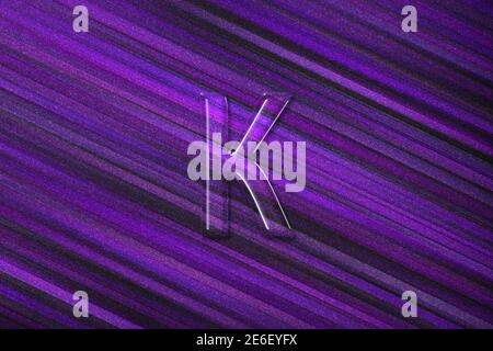 Kappa sign. Kappa letter, Greek alphabet Symbol, violet background Stock Photo