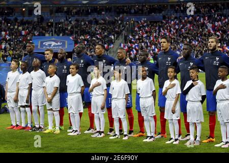 Football Soccer - France v Russia - International Friendly - Stade de France stadium, Saint-Denis, France - 29/03/16. France's players stand during the national anthems before the match. REUTERS/Benoit Tessier