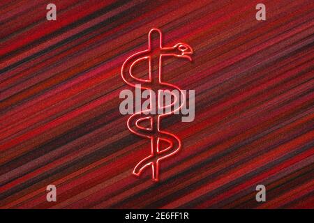 Medical symbol, Rod of Asclepius, Asclepius Insignia, red background Stock Photo