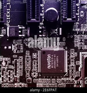 Gifhorn, Germany, Januara 16., 2021: Close-up view of a motherboard with the main processor and CPU of the computing machine. Stock Photo